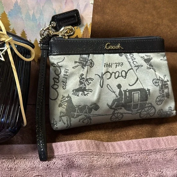 Vintage COACH perfect pre-loved condition wristlet. Two-tone blue with silver.